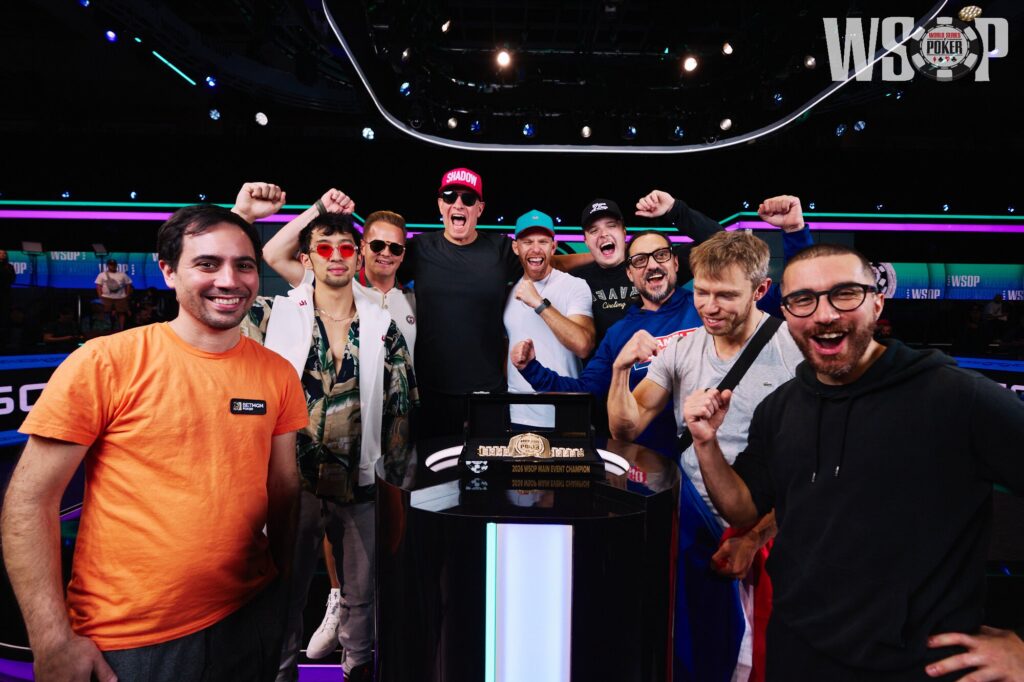 The 2026 WSOP Main Event final table nine players celebrate on the ESPN stage
